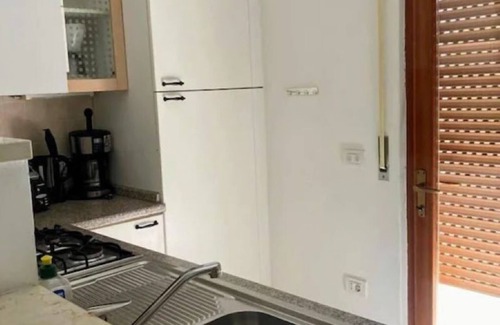 Bardolino Apartment | Apartment with sun terrace, large garden, communal pool, bathroom and guest WC