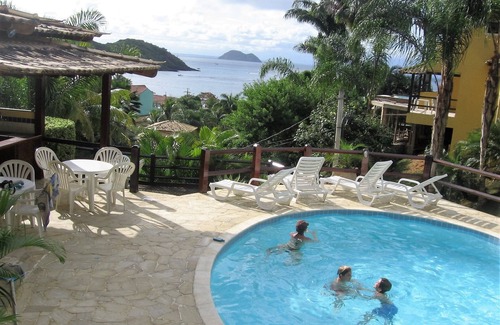 Joao Fernandes Apartment | Apartment with sunset view of the sea in condominium with swimming pool 70m from the best beach in buzios