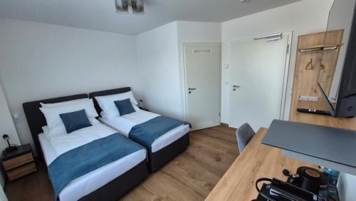 Sondelfingen House | Apartments Seibel Doppel-Zweibettzimmer mit Bad