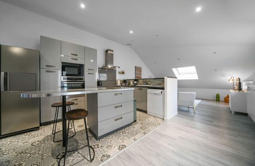 Champ-Capelet Apartment | Appartement 2 chambres style loft parking gratuit