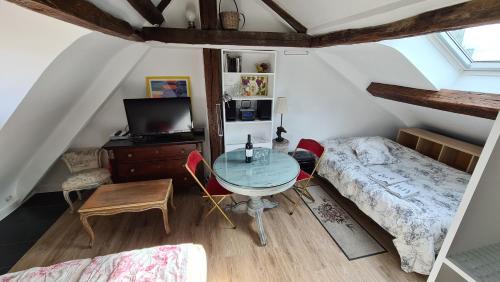 Quartier de la Place-Vendome Apartment | Appartement Cœur de Paris avec vue sur les toits