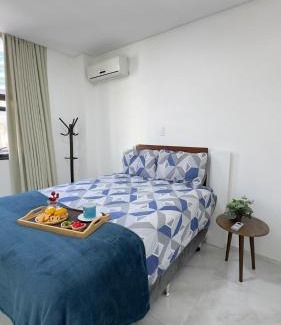 Piratuba Apartment | Apto Girassol - 2 Quartos, Apto moderno,confortável e de frente para avenida principal!