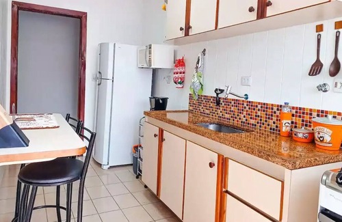 Jardim Belmar Apartment | Ar Condicionado Wi-fi Vaga Coberta Perto da Praia