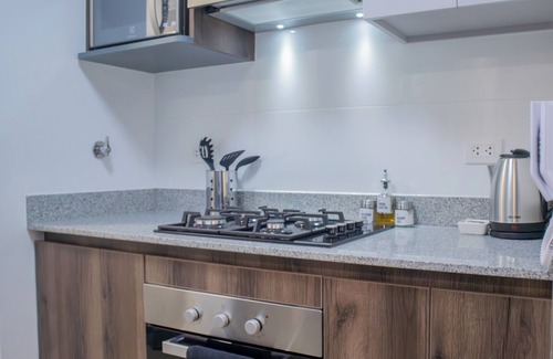 Surquillo Apartment | Arandanos by Wynwood House