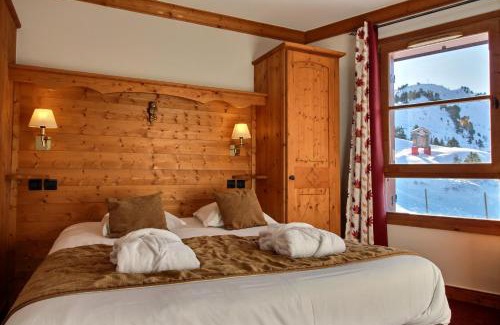Arc-1950 Apartment | ARC 1950 - Appartement 10 personnes Duplex Cheminée - ski aux pieds - Sauna, Hammam, Jacuzzi