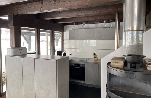 Carezza House | Architect's house Karersee, view of rose garden, Latemar and western Alps