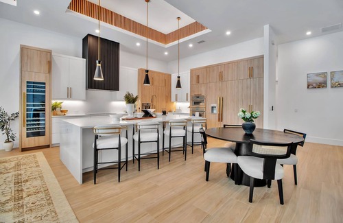 Arlington Park House | Arlington Oasis - Luxury 5 Bed Home, Heated Pool, E-bikes by Gulf Coast Holiday Homes