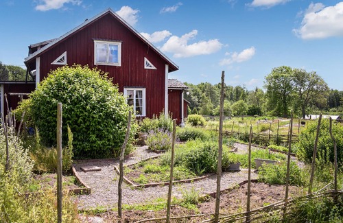 Vimmerby House | Astrid Lindgren House with a large garden right by the lake.
