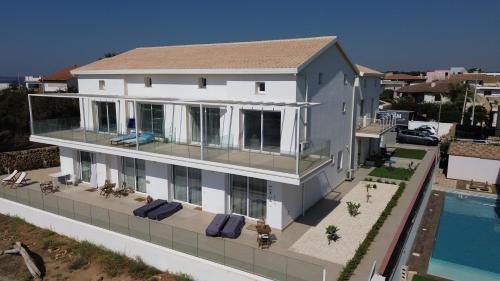 Noto House | Astro apartments with direct access on the sea of Noto heritage of Unesco