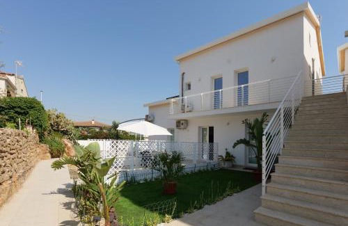 Noto House | Astro apartments with direct access on the sea of Noto heritage of Unesco