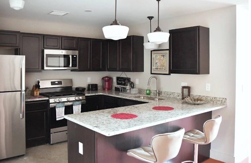 Aurora Apartment | AT YOUR SERVICE! Downtown Aurora 1 Bedroom River Facing Gem
