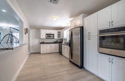 Lochmoor Waterway Estates House | Atlantic Circle Canal & Pool Home