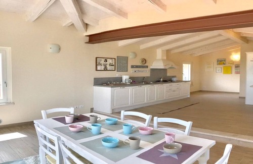 Ponti sul Mincio Apartment | Attic lake view immersed in the Morenic hills
