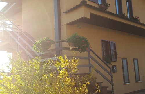 Montano Antilia Apartment | Attic with flowers.