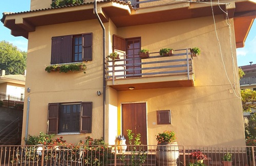 Montano Antilia Apartment | Attic with flowers.