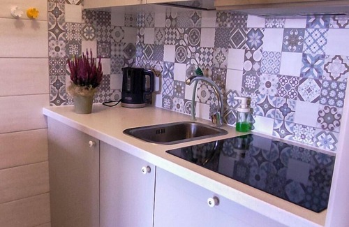 Susello Apartment | Attractive studio with balcony, pool and dream view