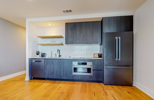 Rainey Street Historic District Condo | Austin city escape with rooftop pool, free WiFi, full kitchen, & lovely views