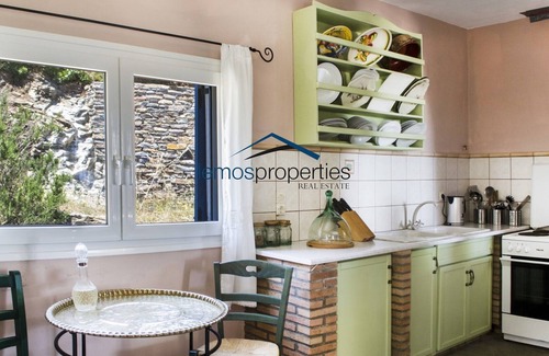 Ioulida House | Authentic stone farmhouse with a sea view set on a large plot of land