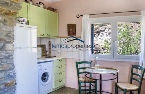 Ioulida House | Authentic stone farmhouse with a sea view set on a large plot of land