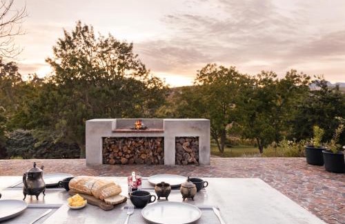 Stellenbosch Apartment | Avemore Vineyard View - wood fired hot tub and full power back up