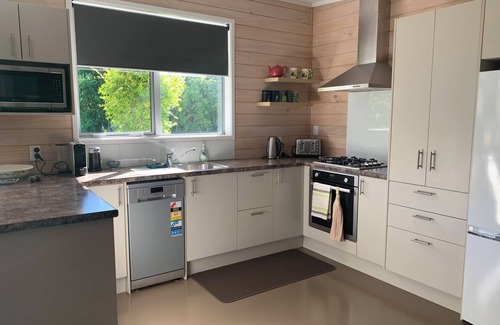 Maungatapere Cottage | AvoStay Cottage - peaceful orchard setting at Maungatapere
