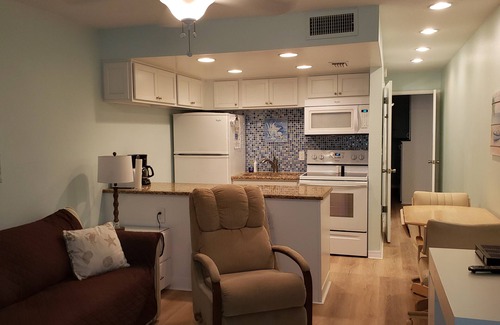 Sunset Beach Condo | Awesome view of the Bay. Pool , Quiet beach neighborhood
