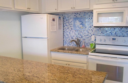 Sunset Beach Condo | Awesome view of the Bay. Pool , Quiet beach neighborhood