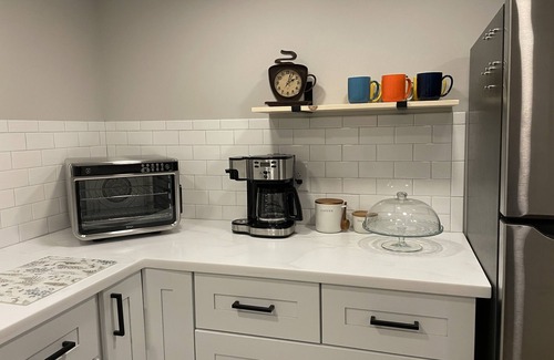 Greensboro Apartment | Axes & Roses: King Bed Forest Hideaway with Kitchen. Quiet retreat.