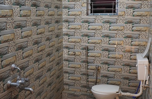 Sualkuchi Apartment | Azure Escape: Stylish 2-Bedroom Retreat in Guwahati with WiFi & AC Comforts