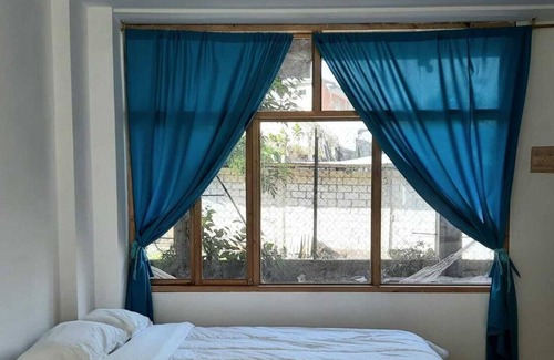 Banos de Agua Santa Cottage | backpackers balconies