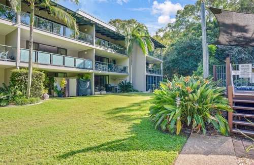 Rainbow Beach Apartment | Baden 58 - Rainbow Shores. Pools, outdoor spa, walk to beach. Tennis court