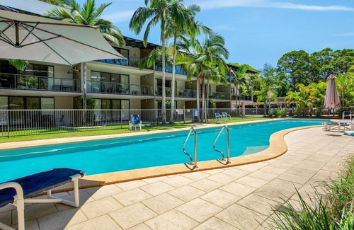 Rainbow Beach Apartment | Baden 58 - Rainbow Shores. Pools, outdoor spa, walk to beach. Tennis court