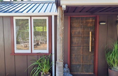 Coromandel Cabin | Bali Haven - Part of Coromandel Eco Sanctuary. Pet Friendly/Tranquil/Chimenea