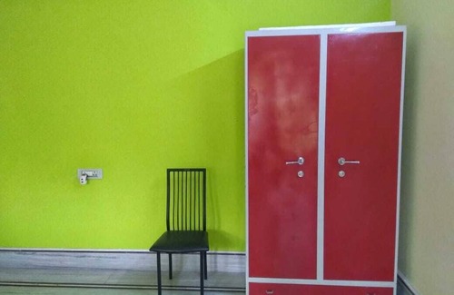Siliguri Apartment | Bashundhara- A beautiful, spacious room with a bath and balcony.