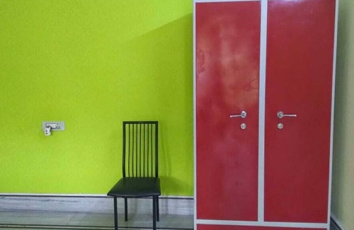 Siliguri Apartment | Bashundhara- A beautiful, spacious room with a bath and balcony.