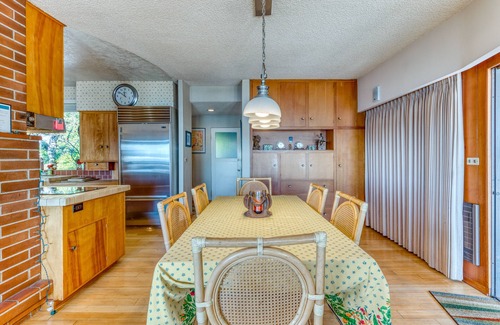North Bend House | Bayfront home with fitness room, WiFi & fun-filled game room