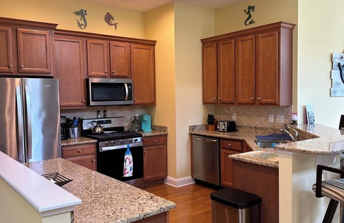 The Commons Villa | Bayside luxury home! Pools, jacuzzi playground Bay view restaurant, golf course!