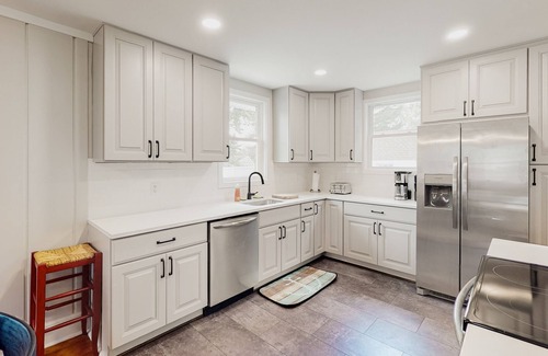 Edgewater House | Beach cottage with firepit, grill, outdoor areas, AC, & W/D