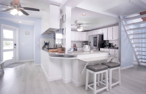 Breezeswept Beach Estates House | Beach Haven: Modern 4-Bed/2-Bath Single Family Home with Breathtaking Open Water