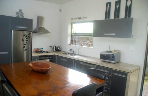 Takitumu District House | Beach Haven, right on the beach
