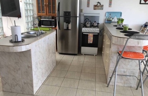 Asia House | Beach House in Asia at KM 97.5 w/Wi-Fi - Mins to boulevard and Cayma beach.