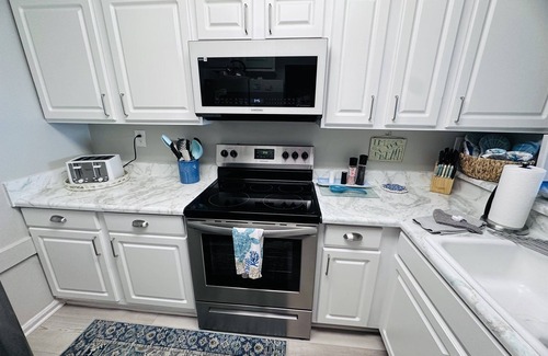 Gulf Lagoon Beach Condo | "Beach Please" PCB - Small Pet Friendly 2/2 Condo ON Beach! FREE Beach Chair Svc