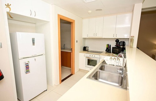 Al Raha Beach Apartment | Beachfront Beauty: 1BR Retreat for Your Getaway