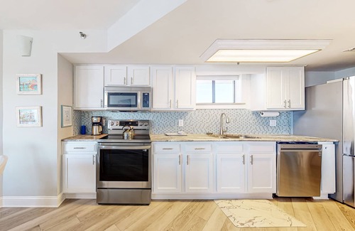 Wrightsville Beach Condo | Beachfront condo with on-site pool, ocean view, & private balcony
