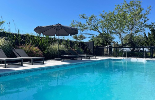 Orient House | Beachfront Heated Pool Hot Tub Orient Village Modern Dream Home