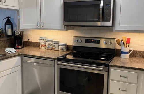 Biltmore Beach Condo | Beachfront Living with a Postcard View!