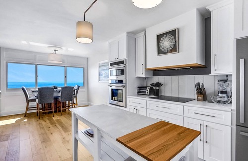Sunnyside House | Beachfront penthouse with Gulf views, pools, beach chairs, saunas & tennis