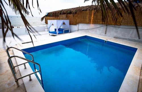 Anjuna Villa | Beachfront pool villa Myconos