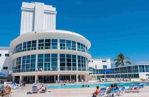 Mid Beach Apartment | Beachfront Property Pool Gym Tennis Miami Beach!
