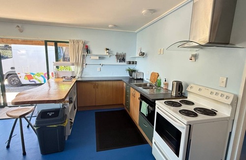Tata Beach House | Beachside Bach Just across the road to Ligar Bay!